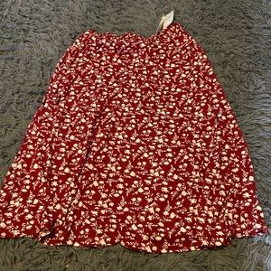 A red and white formal long skirt